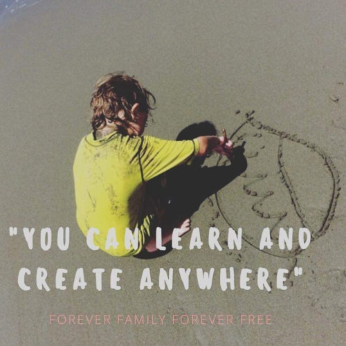 Tyler drawing in the sand